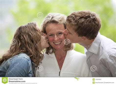Happy Mother Being Kissed By Daughter And Son Stock Image Image Of
