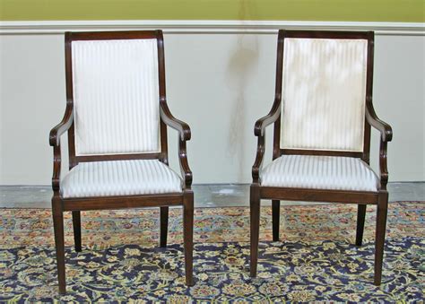 They also cost a lot; Transitional upholstered mahogany dining room chairs