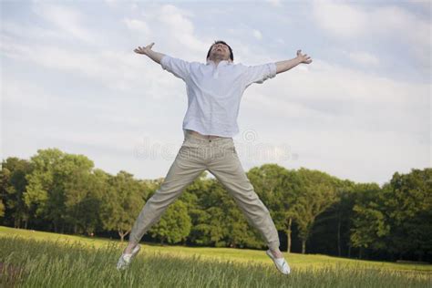 Man Jumping In The Air Stock Photo Image Of Freedom 19476234