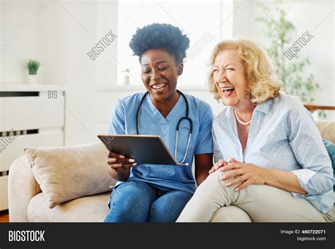 Doctor Nurse Caregiver Image And Photo Free Trial Bigstock
