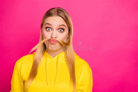 Photo Of Crazy Lady Playing With Curl Making False Moustache Wear Yellow Hoodie Pullover