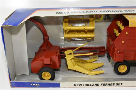 116 New Holland Forage Set With Pull Type Chopper And Wagon Daltons