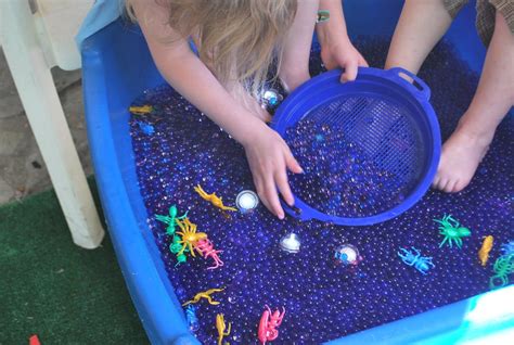 Preschool Projects Sensory Table Water Beads Light And Feet