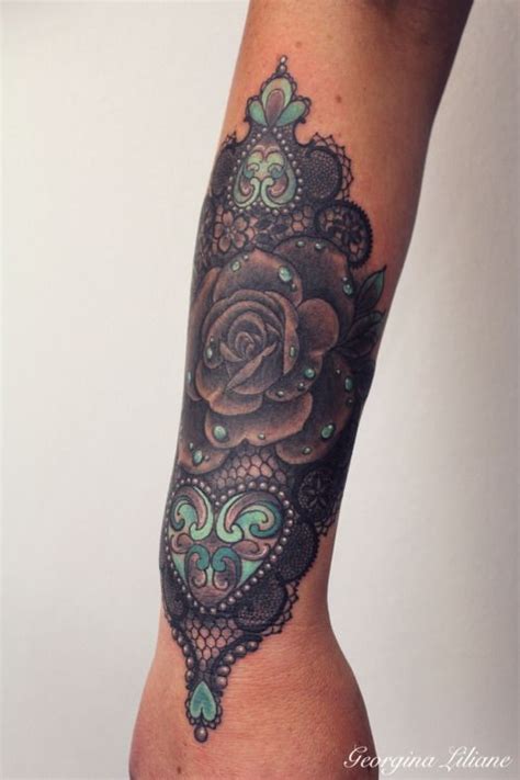 Small wristy cuffs tattooed by @ryanjessiman related tattoos. Tattoos by Georgina | Cuff tattoo, Tattoos, Lace tattoo