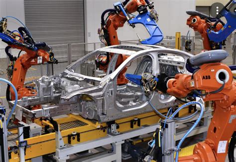 Automaker Factory Robotics What It Means For Jobs And Electric Vehicle