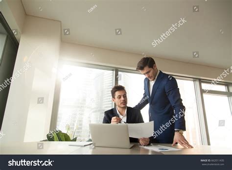 Serious Boss Talking Employee Workplace Discussing Stock Photo