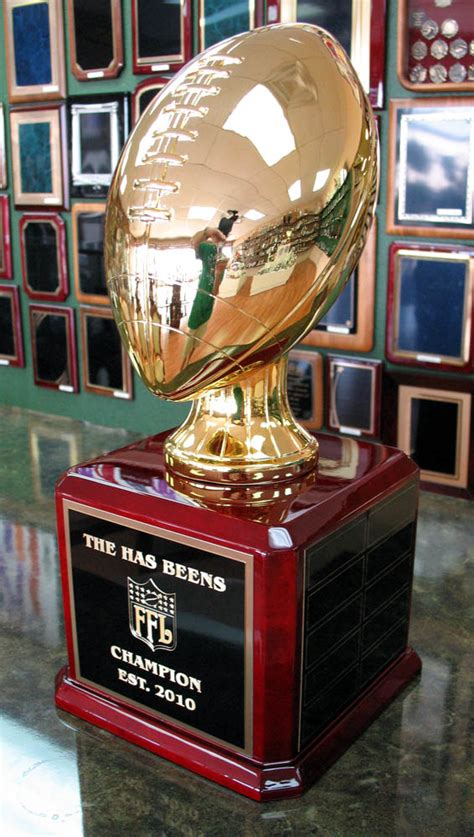 The competitors select their rosters by participating in a draft in which all. 17" Tall Gold Plated Fantasy Football Traveling Trophy ...