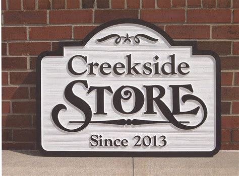 Creekside Store Carved Sign With Carved Background And Raised Letters