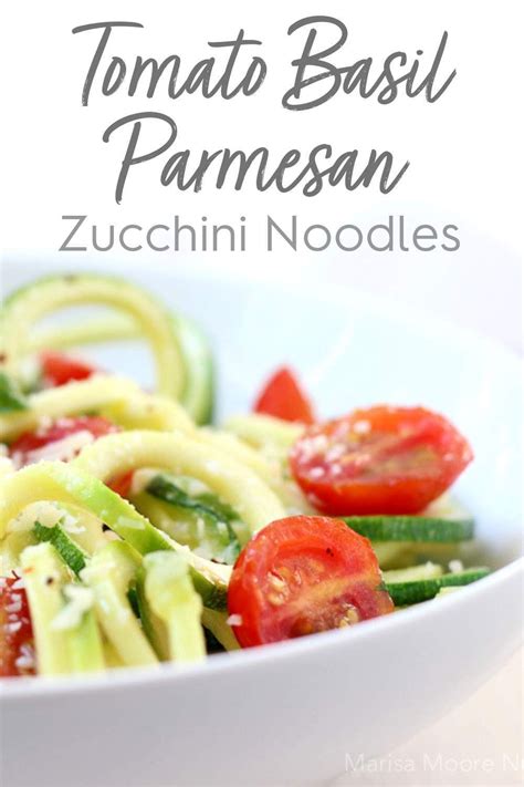 Fresh Spiralized Zucchini Noodles Topped With Fresh Tomatoes Basil And