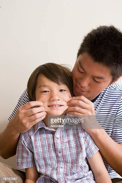 Kids Hand Pinching Photos And Premium High Res Pictures Getty Images