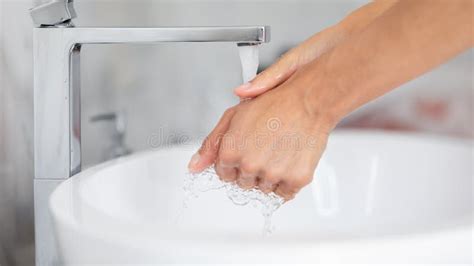 After Toilet Female Washing Hands Using Anti Bacterial Soap Closeup