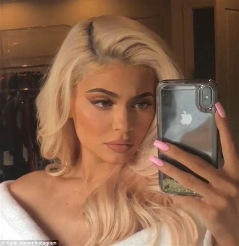Kylie Jenner Squeezes Into Blue Latex Dress As Busy Working Mom Writes