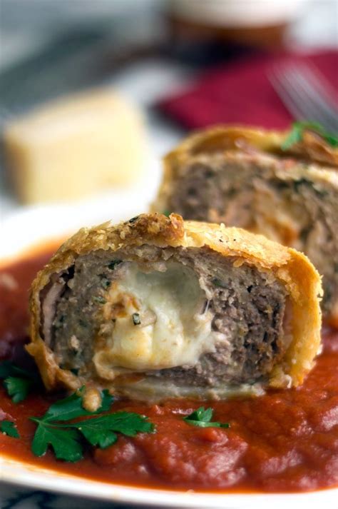 Cheese Stuffed Meatballs Wrapped In Bacon And Pastry Dough Bacon