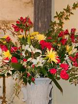 Members of the flower ministry water the live plants in the church and commons area and purchase and arrange the flowers for the celebration of weekend masses. John Oliver Dowdle Interiors: Altar flowers Part 1