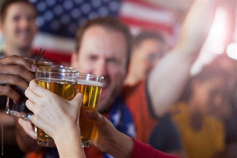 Soccer Fans Raise A Glass To Team Usa By Stocksy Contributor Sean