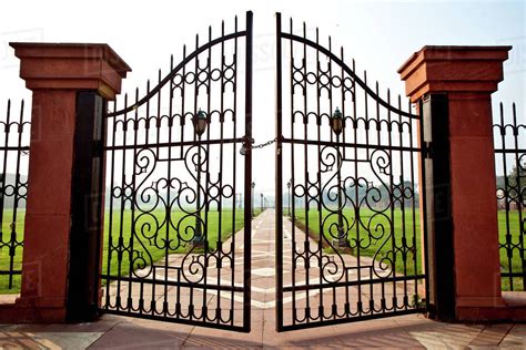 Large Iron Gates Secured With Padlock Stock Photo Dissolve