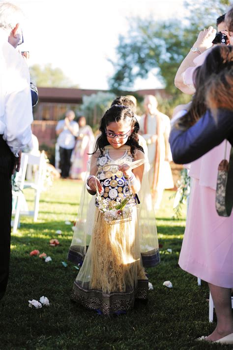 Indian wedding flower bouquets come in large bunches with bright colors. Indian Wedding Flowergirl