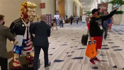 Internet Points And Laughs At Viral Video Of Golden Trump Statue Being Wheeled Around Cpac