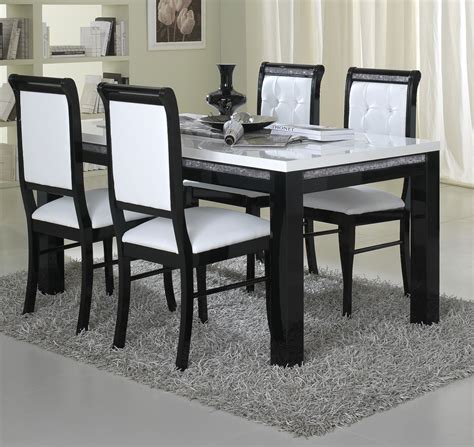 May Daily Black Dining Table And White Chairs
