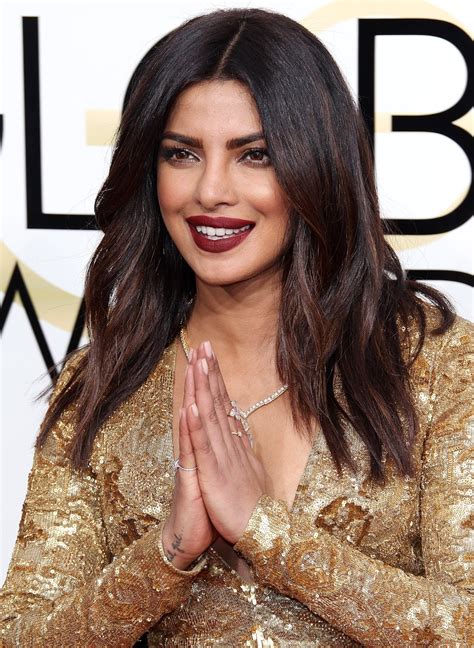 Priyanka Chopra Sexy Cleavage Show At The 74th Annual Golden Globe Awards At The Beverly Hilton