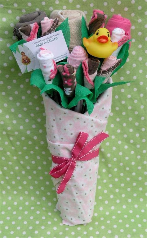 This list that i have created is inspired to the things that really stuck out to me as unique and thoughtful, which are also. Baby clothes bouquet for baby shower gifts. I am "WOWED ...