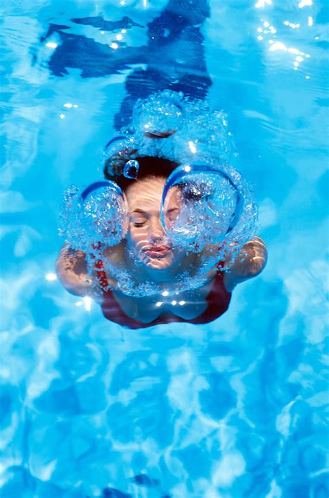 Ann Cutting Photography Swimmer Blows Bubbles In Pool