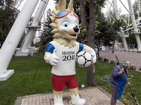 A Cartoonist Is Comparing The World Cup Mascot To A Simpsons Character