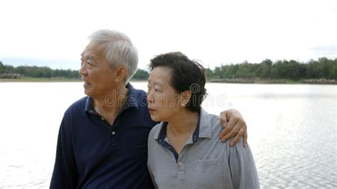 Asian Senior Couple Happy Hugging Together Lake Background Stock Image Image Of Life Chinese