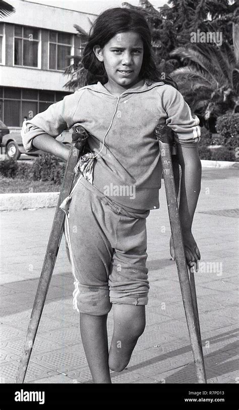 Young Amputee Girl On Crutches Stock Photo Alamy