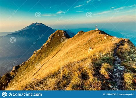 Hikers Shelter At Sunrise On Top Of Italian Alps Mountains Stock Photo