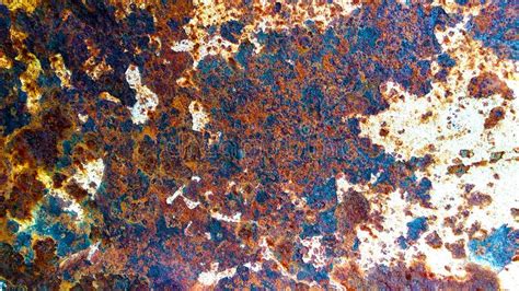 Rust And Corrosion Of Old Metal Painted With White Paint Interspersed