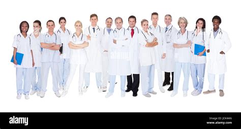 Group Of Smiling Doctors With Stethoscopes Over White Background Stock