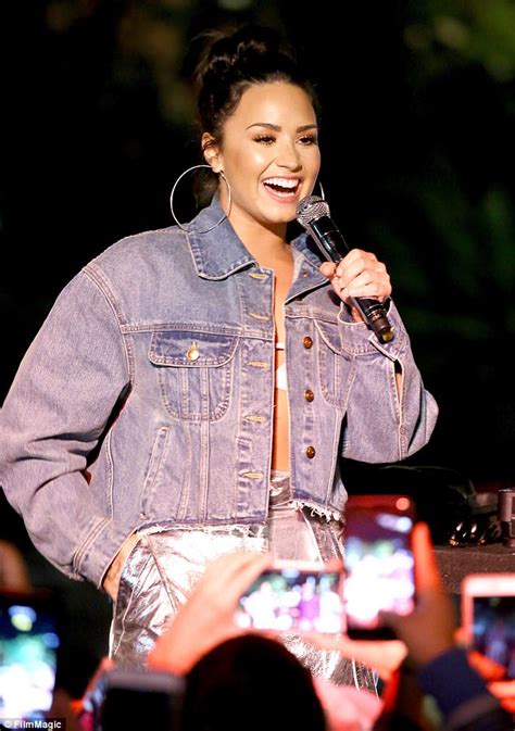 Demi Lovato Dons Metallic Trousers And Denim Jacket Daily Mail Online