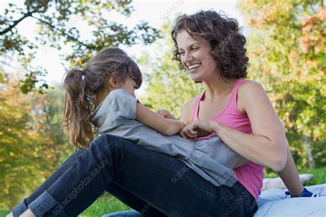 Mother And Daughter Playing Outdoors Stock Image F0052643 Science Photo Library