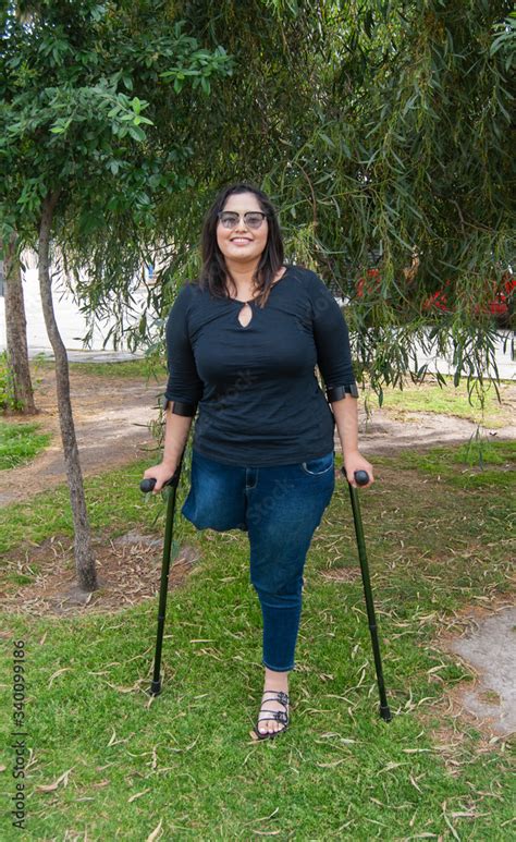Babe Beautiful Amputee Woman Walking With Crutches Stock Photo Adobe Stock