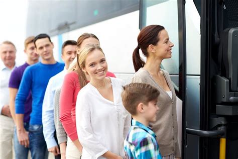 Group Of Happy Passengers Boarding Travel Bus Stock Photo Image Of