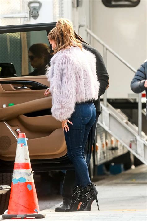 Jennifer Lopez Sports Juicy Top Pink Faux Fur Jacket And Skin Tight