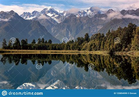 Lake Matheson With Mountains Reflection In The Water New Zealand Stock