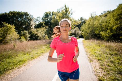 Woman Jogging In Park Stock Image Image Of Person Authentic 70671685