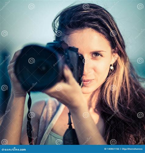 Portrait Of A Woman Photographer With Camera Stock Photo Image Of