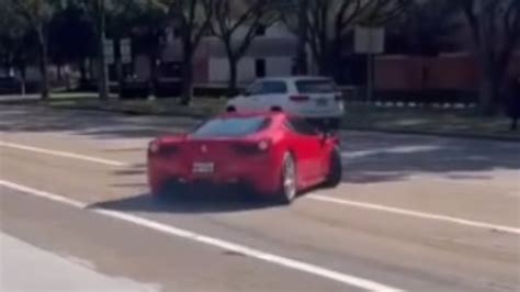 Dozy Driver In £200000 Ferrari Supercar Tries Showing Off At A Car