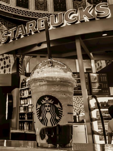 Starbucks Stall Grayscale Photo · Free Stock Photo