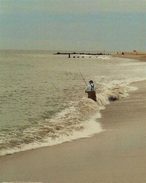 Lone Fisherman Photograph By John Scates Fine Art America