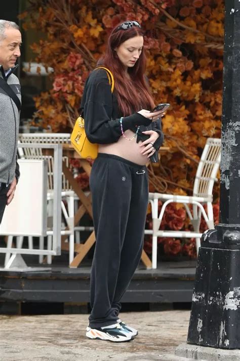 Pregnant Sophie Turner Shows Off Growing Bump In Ripped Cropped Top