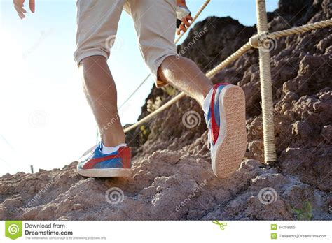 Close Up Of Hiker Legs Trekking Along A Rocky Path Stock Image Image