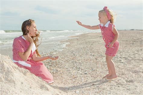 Mother And Her Daughter Having Fun On The Beach Stock Image Image Of Laughing Little 58574505