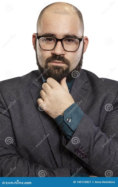 Serious Young Bald Man In Glasses With A Beard Close Up Isolated On A White Background Stock