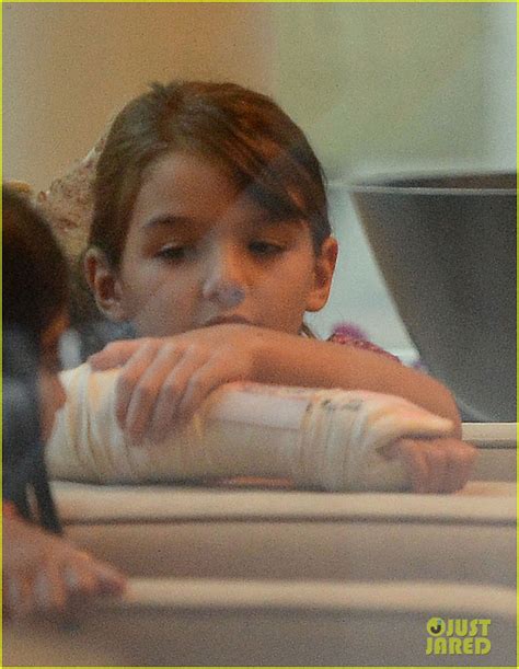 Katie Holmes Pampers Suri After She Breaks Her Arm Photo