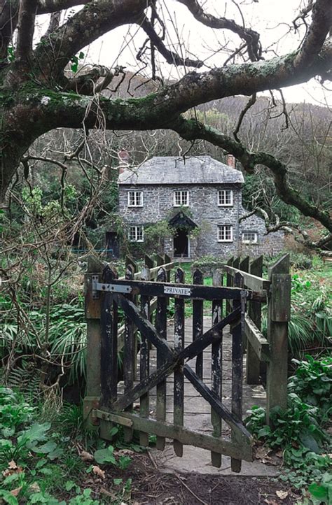 A Stone Cottage With A Gate Which Says Private Hidden In