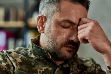 Portrait Of Middle Aged Sad Desperate Military Man Looking Thoughtful